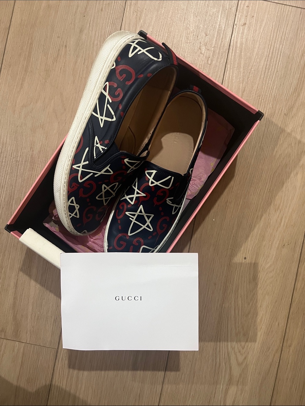 Gucci Navy Slip-On Sneakers with Red & White Star Motif